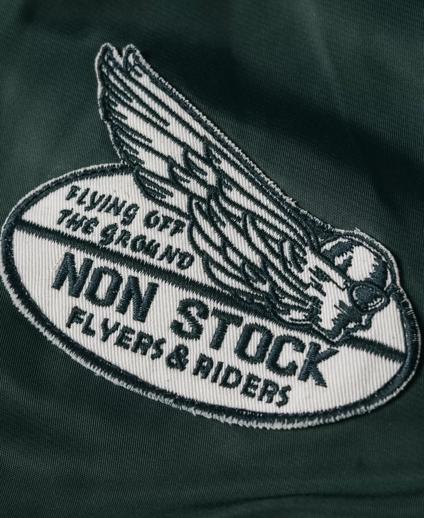 logoappliqued_nylon_coach_jacket__green_9.webp Store Logo-Appliqued Nylon Coach Jacket - Green Jackets & Coats