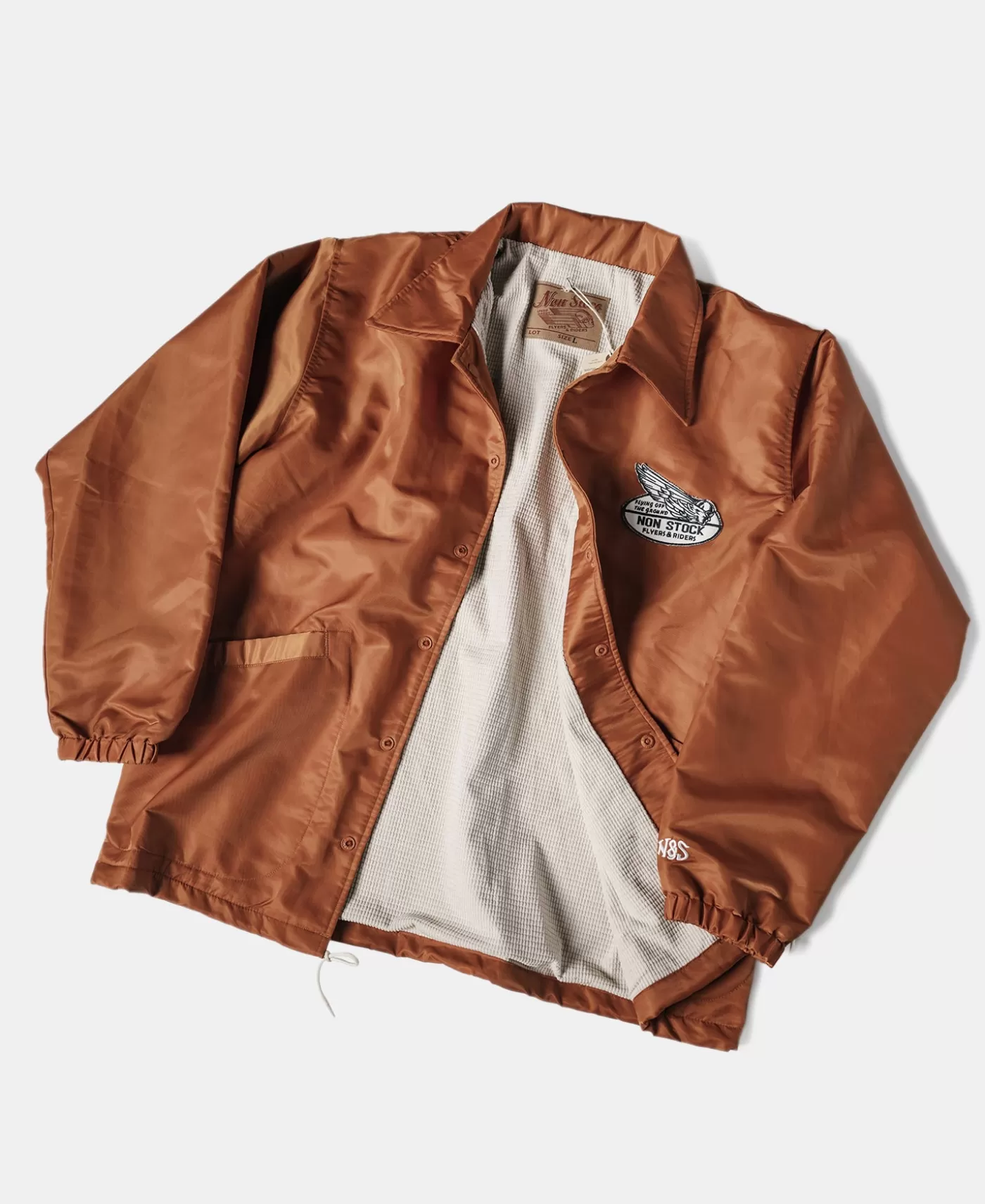 logoappliqued_nylon_coach_jacket__orange_2.webp New Logo-Appliqued Nylon Coach Jacket - Jackets & Coats