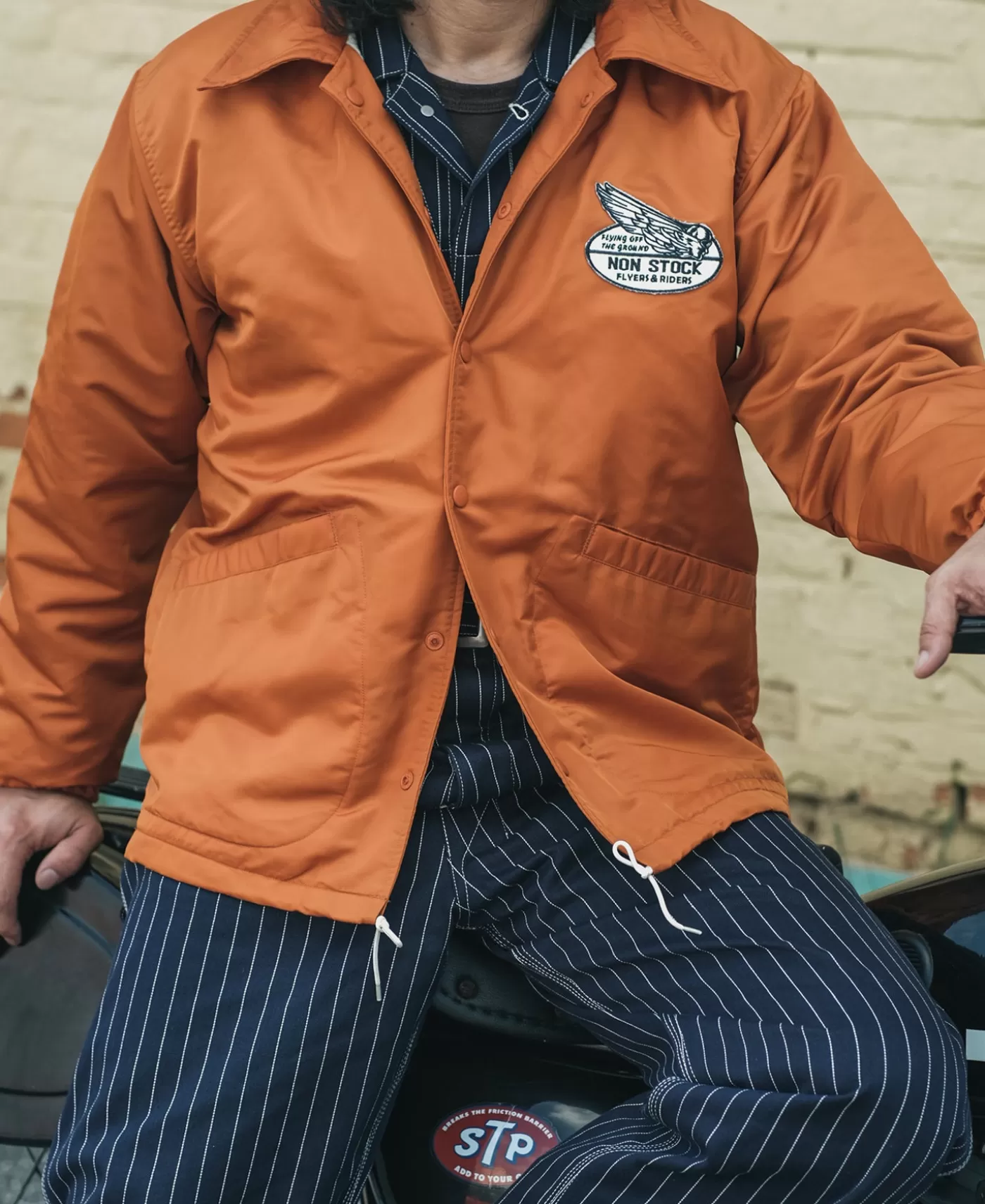 logoappliqued_nylon_coach_jacket__orange_3.webp New Logo-Appliqued Nylon Coach Jacket - Jackets & Coats