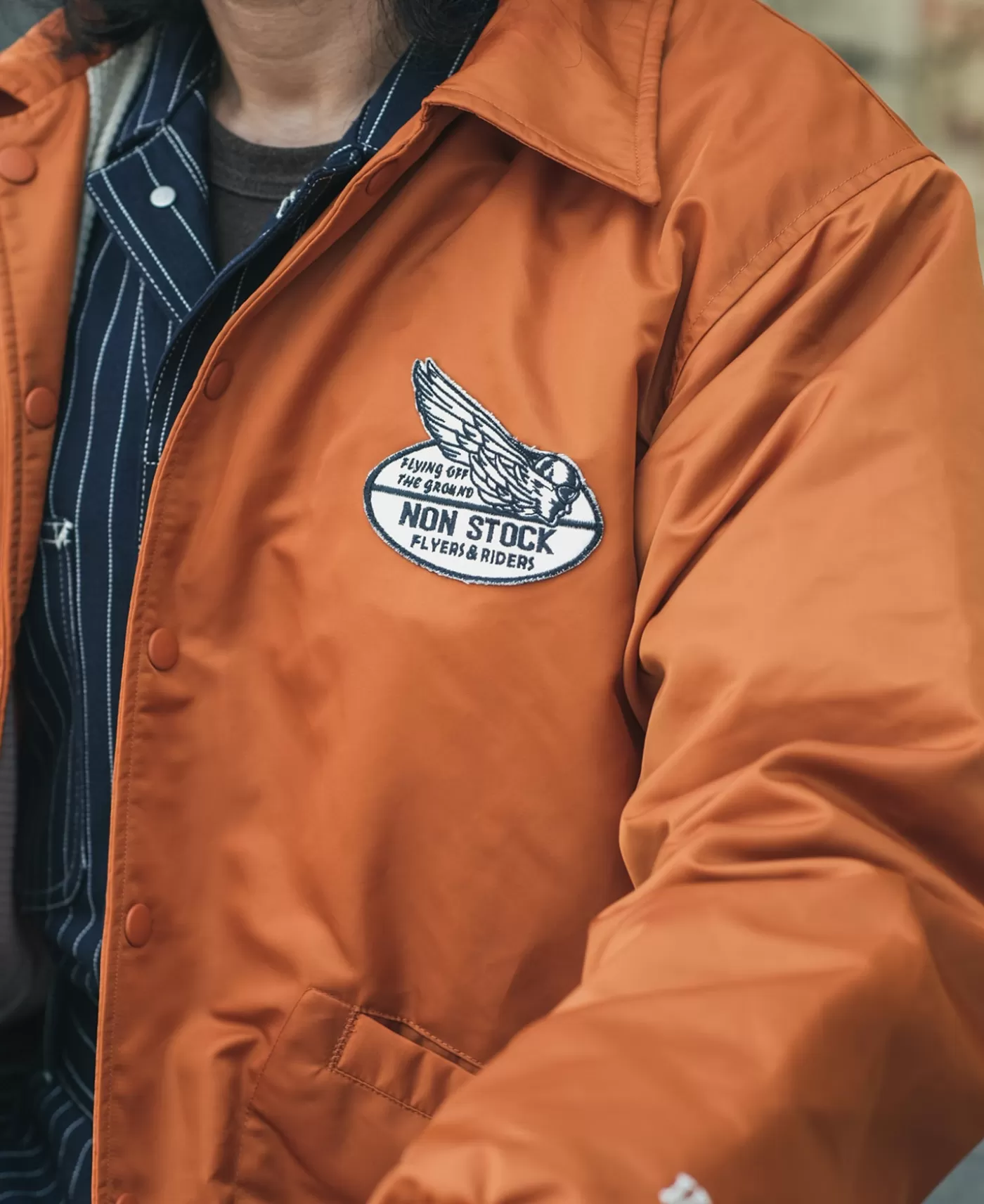 logoappliqued_nylon_coach_jacket__orange_4.webp New Logo-Appliqued Nylon Coach Jacket - Jackets & Coats